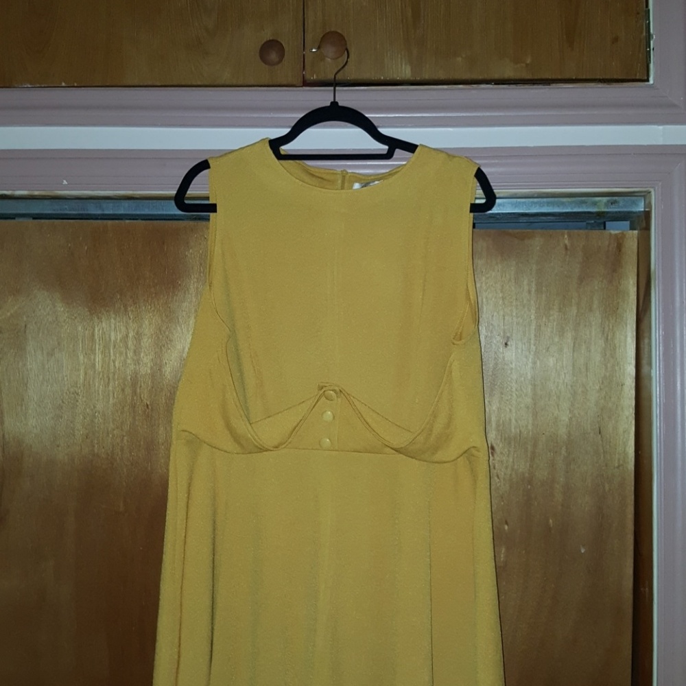 Sleeveless mustard color dress